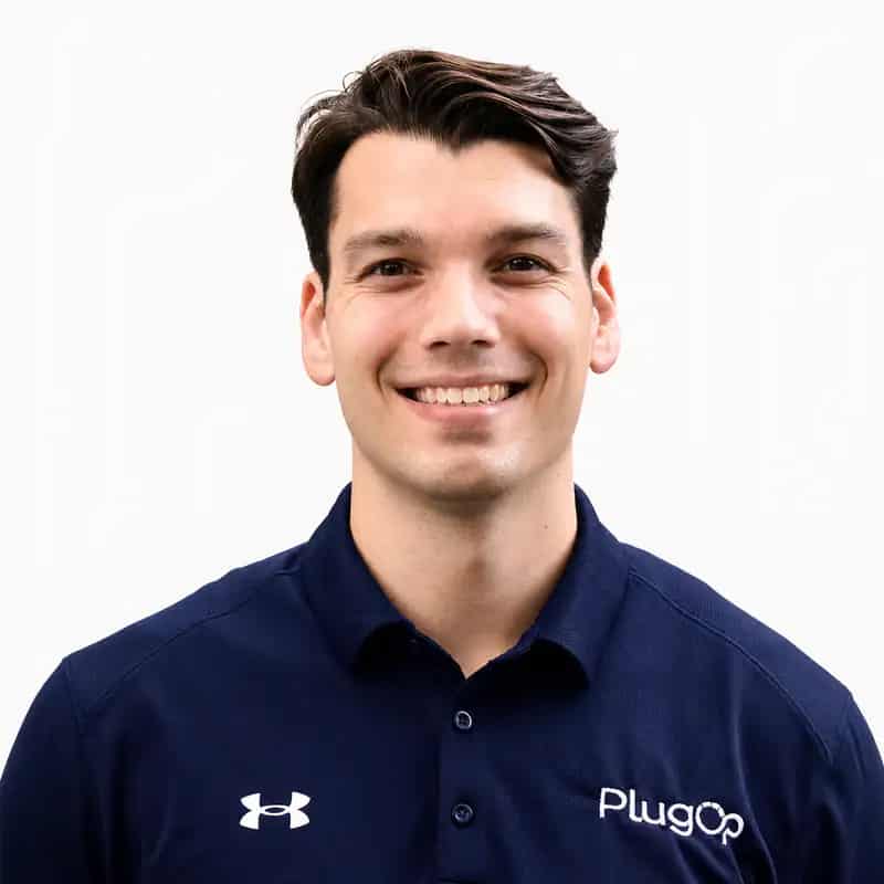Portrait of Alex Sibila, VP of Operations at PlugOp